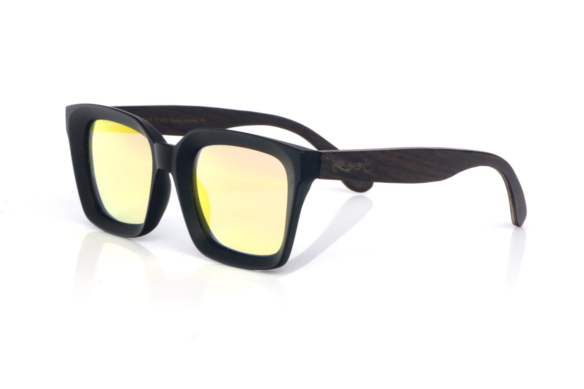 Wood eyewear of Oak ASH 2. The ASH 2 wooden sunglasses feature a clean black front and a bold look you notice as soon as you put them on, with a soft square shape that’s both sleek and powerful.
The contrast comes from the oak temples, which add warmth and an organic touch. The wood looks and feels premium: natural grain, a defined profile, and a curve that helps them sit securely, giving a stable feel. Full UV protection.

Measurements: 148x50
Caliber: 51
 for Wholesale & Retail | Root Sunglasses® 