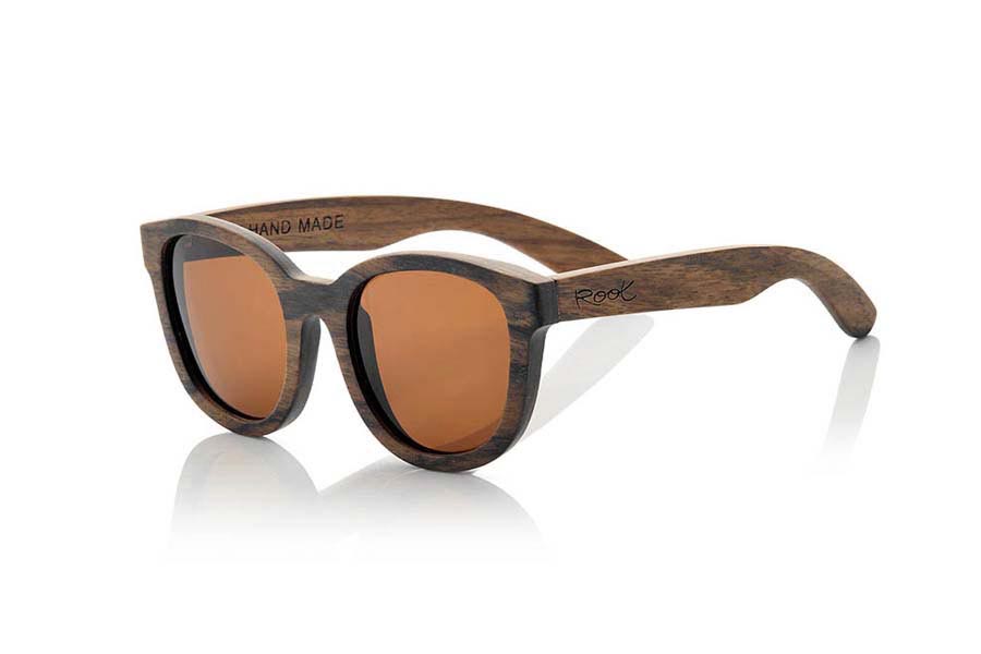 Wood eyewear of Ebony AUDREY. The Audrey Sunglasses are made of ebony wood, The Audrey is a very special model with a vintage twist grain, wood color, form and size combine to perfection in people who like models something dimensioned . Simply spectacular. Front Measure: 144x53mm for Wholesale & Retail | Root Sunglasses® 