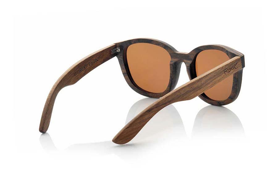 Wood eyewear of Ebony AUDREY. The Audrey Sunglasses are made of ebony wood, The Audrey is a very special model with a vintage twist grain, wood color, form and size combine to perfection in people who like models something dimensioned . Simply spectacular. Front Measure: 144x53mm for Wholesale & Retail | Root Sunglasses® 