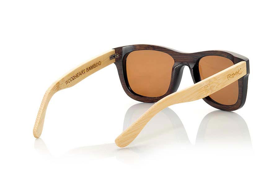Wood eyewear of Bamboo WOODHEART. The sunglasses Woodheart are made of bamboo wood, with the front dyed  in brown tones and sideburns in natural bamboo color  where the wood grain is always present it is a classical frame standard size that feels good to both boys and girls.  Front measssure 147x50mm for Wholesale & Retail | Root Sunglasses® 