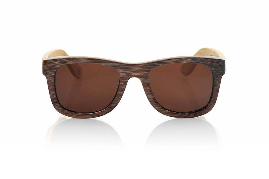 Wood eyewear of Bamboo WOODHEART. The sunglasses Woodheart are made of bamboo wood, with the front dyed  in brown tones and sideburns in natural bamboo color  where the wood grain is always present it is a classical frame standard size that feels good to both boys and girls.  Front measssure 147x50mm for Wholesale & Retail | Root Sunglasses® 