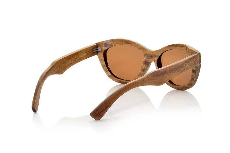 Wood eyewear of Lignum NOINA. Noina wooden Sunglasses  are made of wood Lignum which has a hazelnut color with green and whose grain are not as marked as in other types of wood. Suggestive shape the Noina are a premium choice in a special very beutifull wood. measures 142x50mm for Wholesale & Retail | Root Sunglasses® 