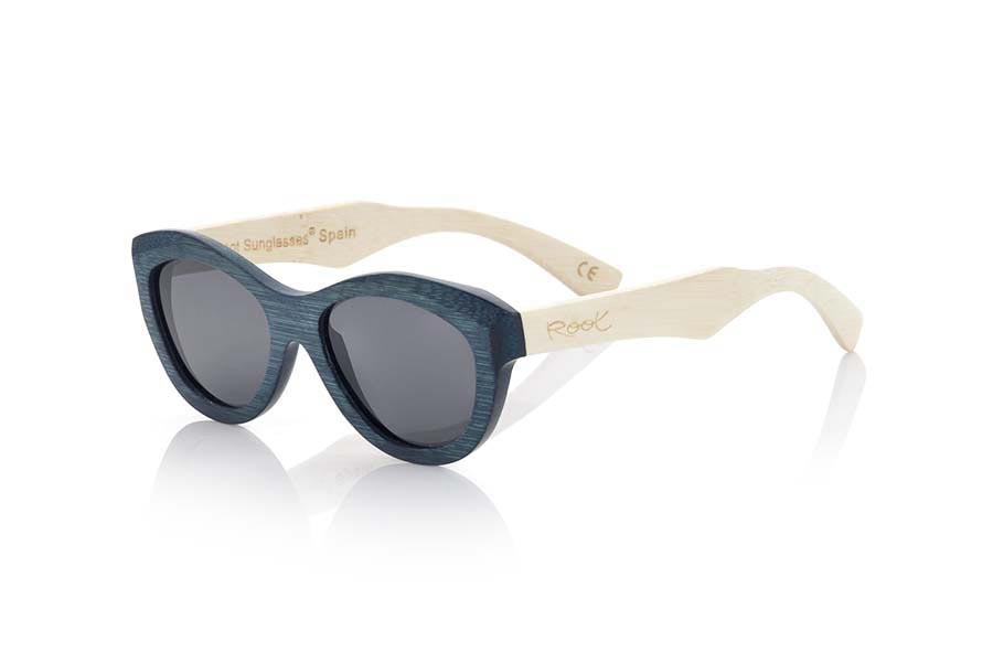 Wood eyewear of Bamboo YEMAYÁ. Yemayá wooden Sunglasses are made of bamboo wood with deep blue tinted front pin natural bamboo and blue mirror lenses, suggestive lines in a modern style, daring where you feel safe from other prying eyes. measures 142x50mm for Wholesale & Retail | Root Sunglasses® 