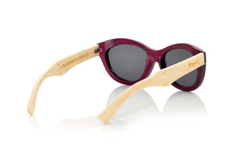 Wood eyewear of Bamboo MAHOGANY.  Mahogany wood Sunglasses are made by combining natural bamboo on pins and purple stained bamboo on the front: dyes reveal the grain of the wood. They have a size suitable for faces not too broad and very sexy ways that surprise, be seduced. Front Measure: 142x50mm for Wholesale & Retail | Root Sunglasses® 