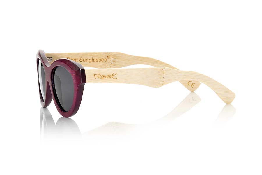 Wood eyewear of Bamboo MAHOGANY.  Mahogany wood Sunglasses are made by combining natural bamboo on pins and purple stained bamboo on the front: dyes reveal the grain of the wood. They have a size suitable for faces not too broad and very sexy ways that surprise, be seduced. Front Measure: 142x50mm for Wholesale & Retail | Root Sunglasses® 