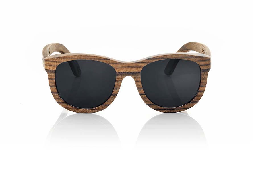 Wood eyewear of Zebrano KALETA. Kaleta sunglasses are made of wood Zebra. This wood has a color and a marked countersunk dark streak, rounded shapes sit well with all types of people and faces, Kaleta are one of the most popular models of our catalog for its elegance and simplicity. Front Measure: 141x52mm for Wholesale & Retail | Root Sunglasses® 