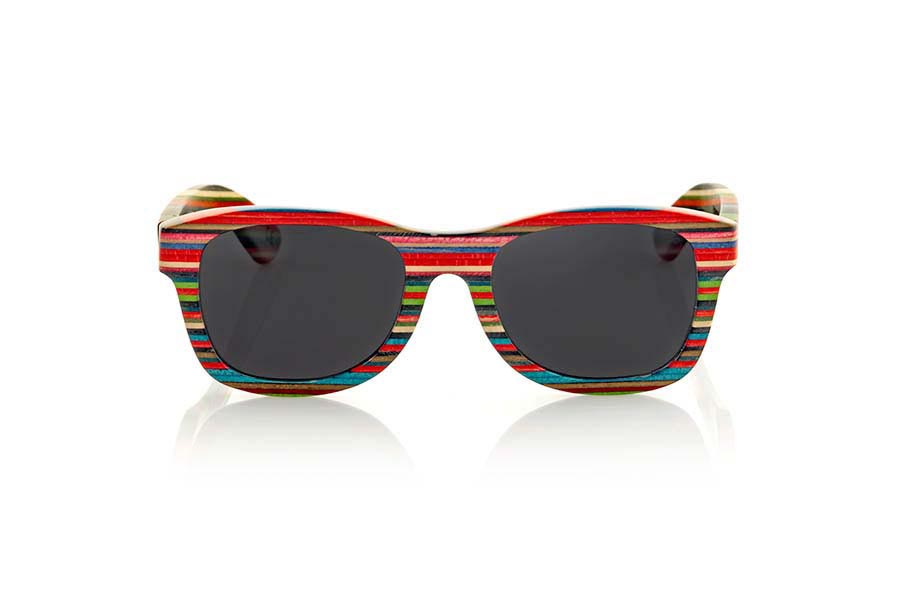 Wood eyewear of Skateboard SABAY. Sunglasses Sabay are made of laminated 9 layers with a pattern of nine colored wood frame has a slightly smaller size than other similar models as the Amazonian or Volcano and are really good to almost everyone, the Sabay are a very special model that surprised friends and strangers. Now available in different lens combinations. Front Measure: 144x49mm for Wholesale & Retail | Root Sunglasses® 