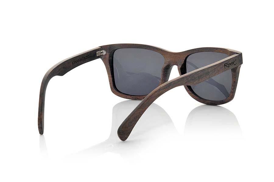 Wood eyewear of Monzo KANAA. Kanaa sunglasses are handmade from natural Monzo wood,  This wood is reddish brown or deep brown color, very hard and resistant to the passage of time. Are combined with grey lenses, the Kanaa is a somewhat angular dimensioning nice model. Front Size: 145x50mm for Wholesale & Retail | Root Sunglasses® 