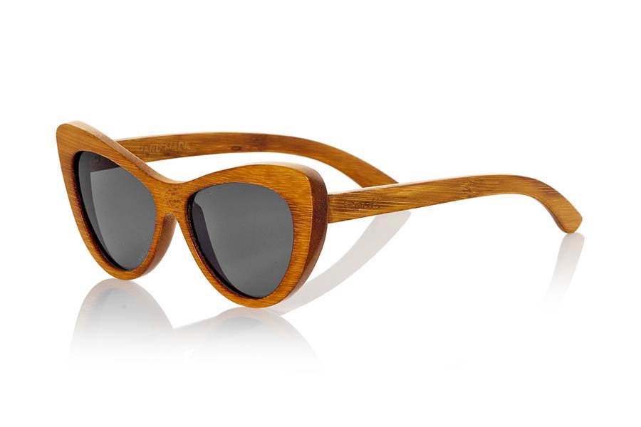 Wood eyewear of Bamboo GOBI. Gobi sunglasses are made with natural bamboo wood in combination with gray tinted lenses or yellow yellows REVO is a striking butterfly-shaped model with which you will not go unnoticed. Available in two sizes. Normal front Size: 147x49mm  for Wholesale & Retail | Root Sunglasses® 