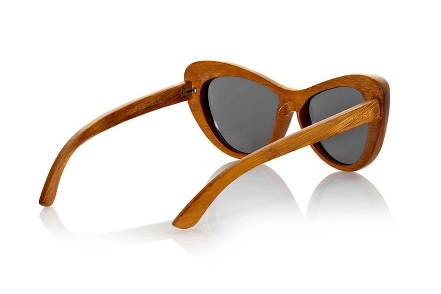 Wood eyewear of Bamboo GOBI. Gobi sunglasses are made with natural bamboo wood in combination with gray tinted lenses or yellow yellows REVO is a striking butterfly-shaped model with which you will not go unnoticed. Available in two sizes. Normal front Size: 147x49mm  for Wholesale & Retail | Root Sunglasses® 