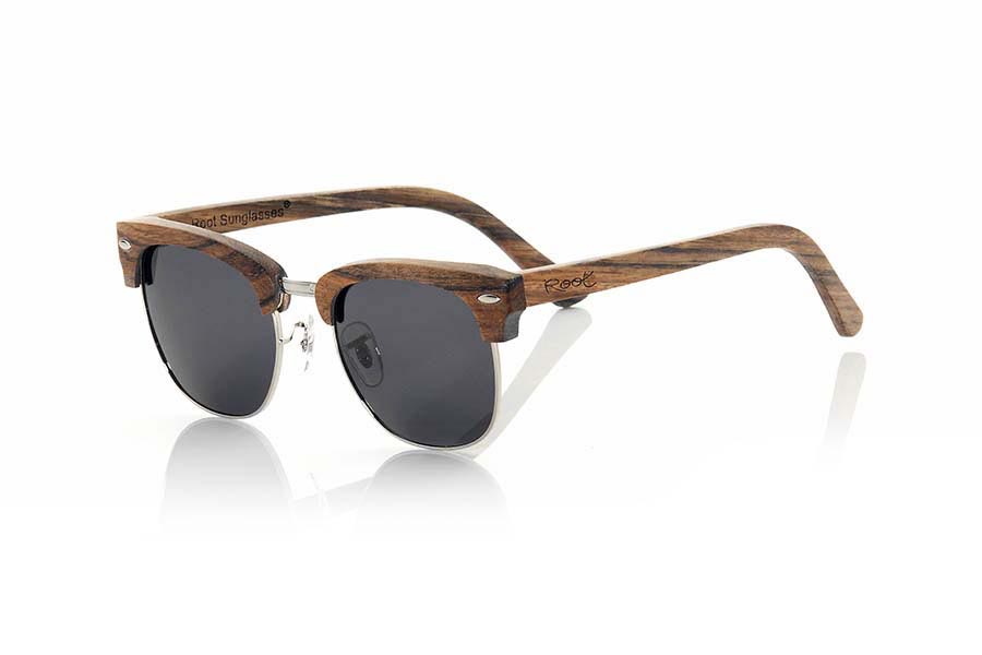 Wood eyewear of Ebony KYZYL. Kyzyl sunglasses are made of ebony wood combined with gray lenses. Spectacular model in a beautiful wood combined with silver metallic elements. KYZYL sunglasses include a practical folding case that keeps your glasses safe when they are  inside and takes up very little space when folded.Front Size: 140x47mm for Wholesale & Retail | Root Sunglasses® 