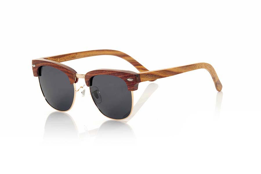 Wood eyewear of Sandal DASHT. Dasht sunglasses are made of sandalwood combined with gray lenses. It is a fantastic model made with a combined beautiful wood with gold metal elements. DASHT sunglasses include a practical folding case that keeps your glasses safe when they are  inside and takes up very little space when folded.Front Size: 140x47mm for Wholesale & Retail | Root Sunglasses® 