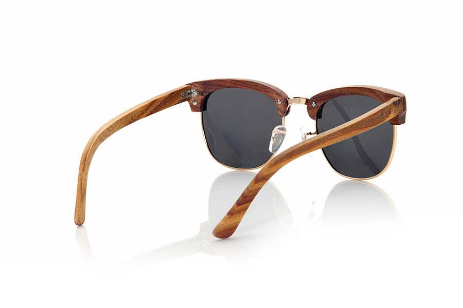 Wood eyewear of Sandal DASHT. Dasht sunglasses are made of sandalwood combined with gray lenses. It is a fantastic model made with a combined beautiful wood with gold metal elements. DASHT sunglasses include a practical folding case that keeps your glasses safe when they are  inside and takes up very little space when folded.Front Size: 140x47mm for Wholesale & Retail | Root Sunglasses® 