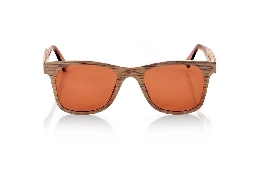 Wood eyewear of Pear PALAU. PALAU sunglasses are made manually with pear wood. This stunning model has been fabricated aluminum sheets sandwiching between several thin layers of wood Peral. The result is a beautiful model, ultra-thin (4mm only) and ultra resistant. The end of the rod is finished in clear acetate quality which allows to adjust the curvature of the rods in the ears if necessary. PALAU sunglasses will surprise you with the beauty of wood finesse its lightness and strength. PALAU sunglasses include a practical folding case that keeps your glasses safe when they are  inside and takes up very little space when folded.Front Measure: 140x47mm for Wholesale & Retail | Root Sunglasses® 