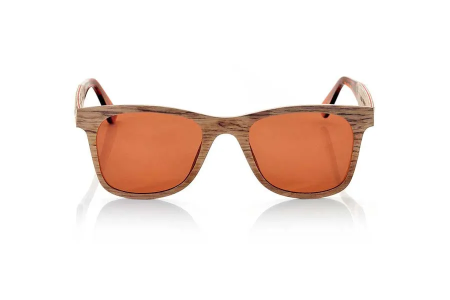 Wood eyewear of Pear PALAU. PALAU sunglasses are made manually with pear wood. This stunning model has been fabricated aluminum sheets sandwiching between several thin layers of wood Peral. The result is a beautiful model, ultra-thin (4mm only) and ultra resistant. The end of the rod is finished in clear acetate quality which allows to adjust the curvature of the rods in the ears if necessary. PALAU sunglasses will surprise you with the beauty of wood finesse its lightness and strength. PALAU sunglasses include a practical folding case that keeps your glasses safe when they are  inside and takes up very little space when folded.Front Measure: 140x47mm for Wholesale & Retail | Root Sunglasses® 