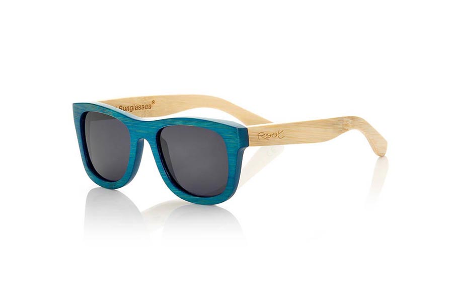 Wood eyewear of Bamboo TROPICBLUE S. TropicBlue sunglasses are made of bamboo wood with the front in blue and sideburns in natural bamboo combined with blue mirror lenses.is a classic mount with a small size for people who feel better glasses  Small. With which you will not go unnoticed.  Front measssure: 136x44mm for Wholesale & Retail | Root Sunglasses® 