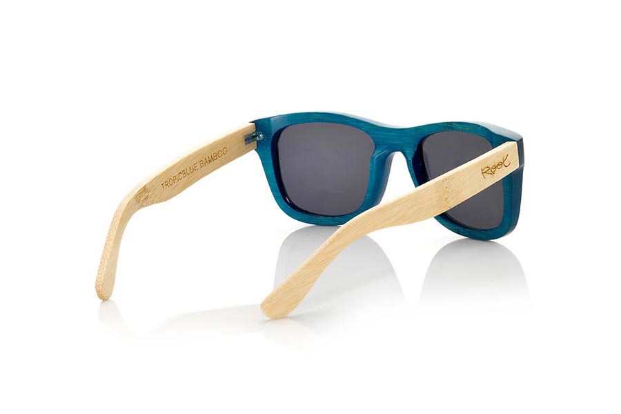 Wood eyewear of Bamboo TROPICBLUE S. TropicBlue sunglasses are made of bamboo wood with the front in blue and sideburns in natural bamboo combined with blue mirror lenses.is a classic mount with a small size for people who feel better glasses  Small. With which you will not go unnoticed.  Front measssure: 136x44mm for Wholesale & Retail | Root Sunglasses® 