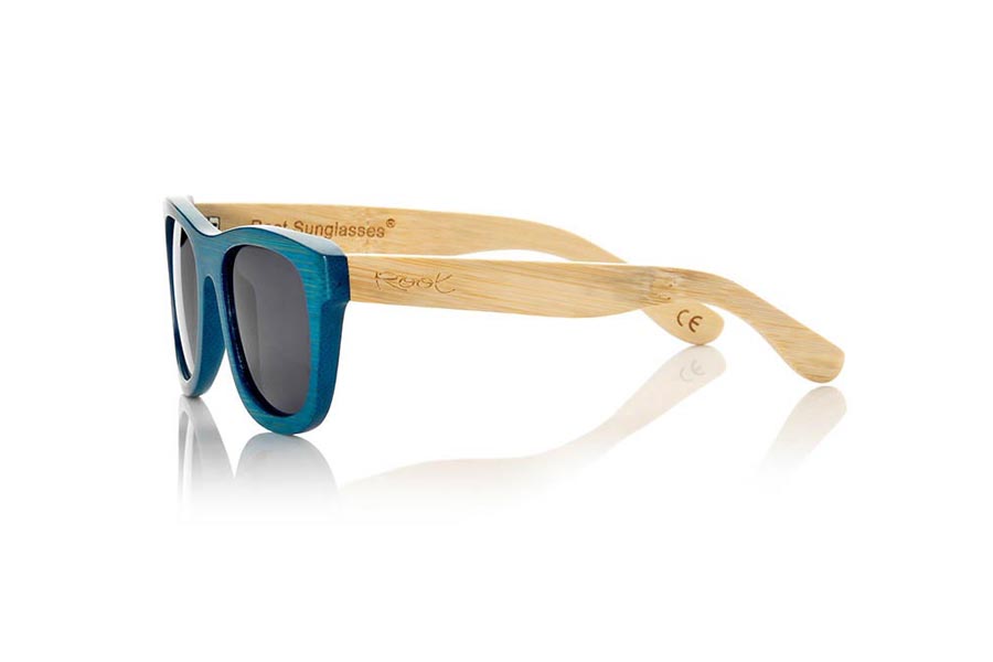 Wood eyewear of Bamboo TROPICBLUE S. TropicBlue sunglasses are made of bamboo wood with the front in blue and sideburns in natural bamboo combined with blue mirror lenses.is a classic mount with a small size for people who feel better glasses  Small. With which you will not go unnoticed.  Front measssure: 136x44mm for Wholesale & Retail | Root Sunglasses® 