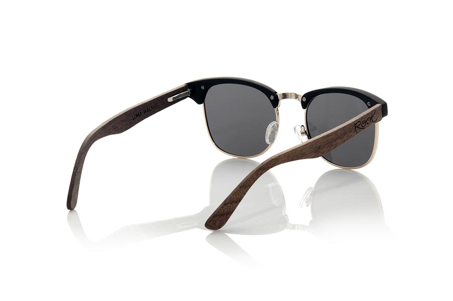 Wood eyewear of Walnut LOMA. LOMA sunglasses are made with the front in PC black matte combined with golden metal and the sideburns in natural walnut wood, combined with various colors of lenses adapt to your style. Frontal measurement: 140x45mm for Wholesale & Retail | Root Sunglasses® 