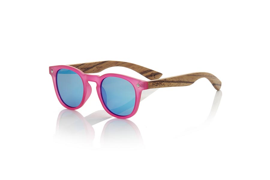 Wood eyewear of Zebrano KID R PINK. The Kid R Pink Children's sunglasses are made with the pink PC frame and natural zebra wood sideburns available in various lens combinations that suit the tastes of children and their daddies. Frontal measurement: 125x41mm for Wholesale & Retail | Root Sunglasses® 