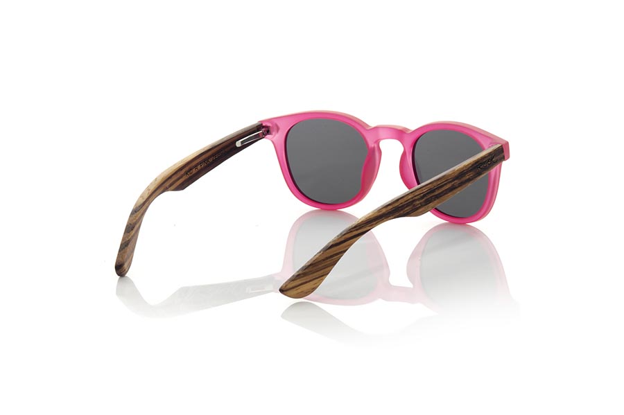 Wood eyewear of Zebrano KID R PINK. The Kid R Pink Children's sunglasses are made with the pink PC frame and natural zebra wood sideburns available in various lens combinations that suit the tastes of children and their daddies. Frontal measurement: 125x41mm for Wholesale & Retail | Root Sunglasses® 