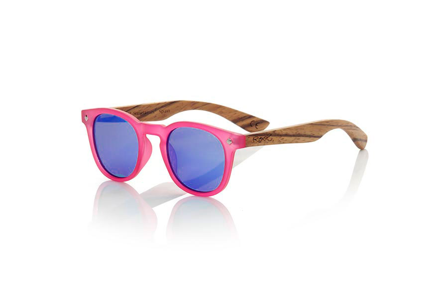 Wood eyewear of Zebrano KID R PINK. The Kid R Pink Children's sunglasses are made with the pink PC frame and natural zebra wood sideburns available in various lens combinations that suit the tastes of children and their daddies. Frontal measurement: 125x41mm for Wholesale & Retail | Root Sunglasses® 