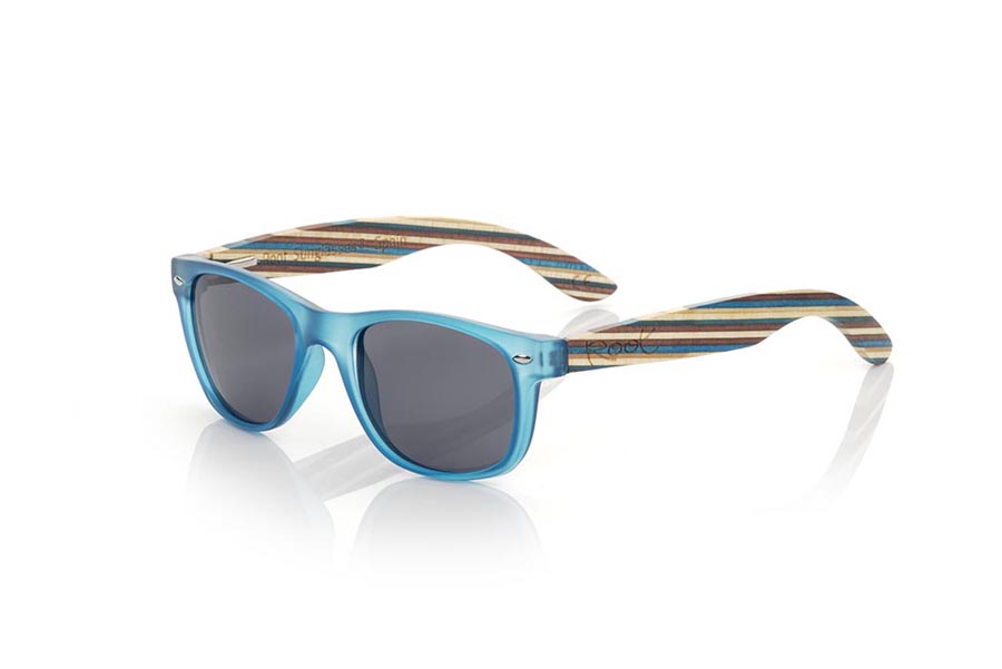 Wood eyewear of Maple KID W BLUE. The KID W BLUE children's sunglasses are made with the Blue PC frame and colored laminated maple wood sideburns available in various combinations of lenses that suit the tastes of children and their parents. Front measurement: 136x40mm for Wholesale & Retail | Root Sunglasses® 