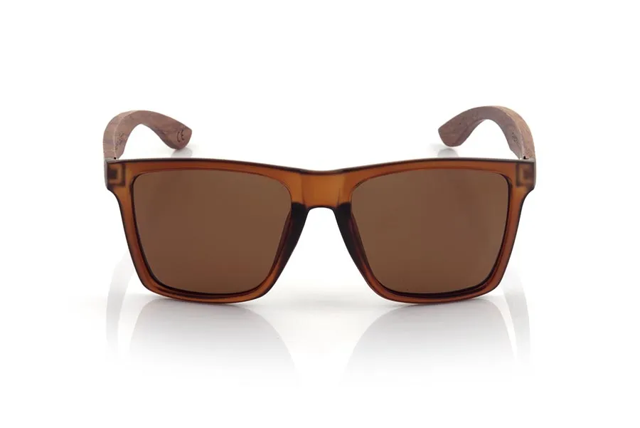 Wood eyewear of rosewood RUN BROWN DS. RUN BROWN DS sunglasses are made with the front of transparent matte synthetic brown material and sideburns in brown rosewood, it is a very male angled square model with a look at the famous okley combined with four colors of lenses that will adapt perfectly to your taste and to your modern style. Front size: 144X51mm for Wholesale & Retail | Root Sunglasses® 