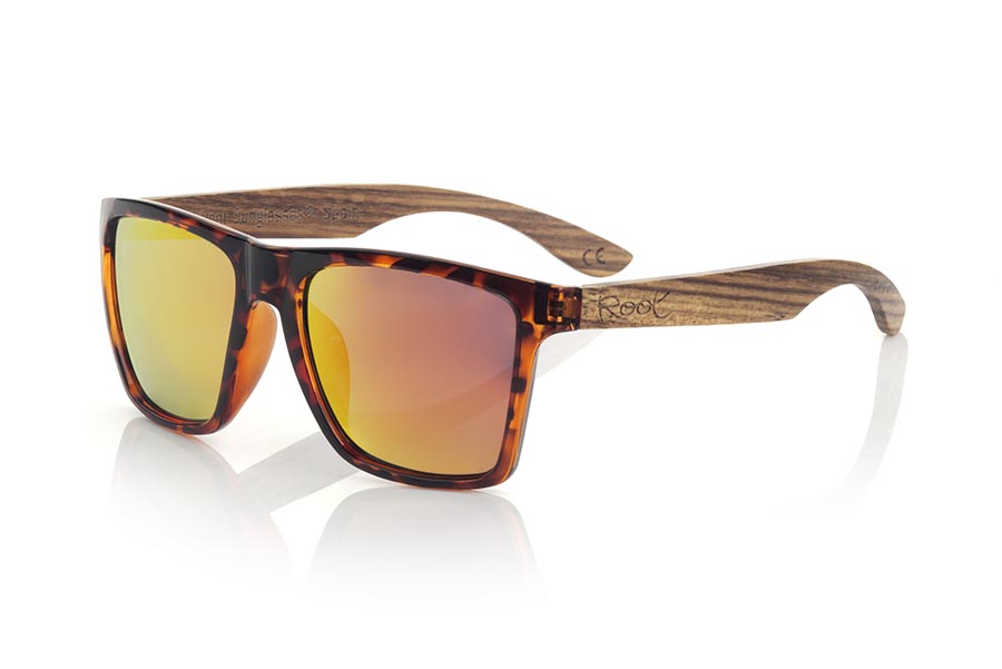 Wood eyewear of Zebrano RUN CAREY DS. The RUN CAREY DS sunglasses are made with the front of transparent matte synthetic material carey and the temples in ZEBRANO wood, it is a very masculine angular square model with an air to the famous okley combined with four lens colors that are They will adapt perfectly to your taste and your modern style. Front Measurement: 144X51mm for Wholesale & Retail | Root Sunglasses® 