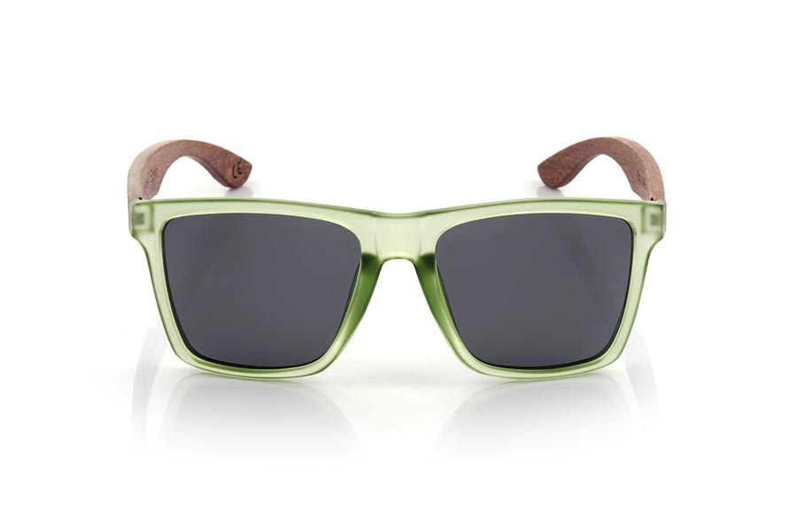 Wood eyewear of rosewood RUN GREEN DS. The RUN GREEN DS sunglasses are made with the front of transparent green matte synthetic material and the temples in rosewood, it is a very masculine angular square model with an air to the famous okley combined with four lens colors that are They will adapt perfectly to your taste and your modern style. Front Measurement: 144X51mm for Wholesale & Retail | Root Sunglasses® 