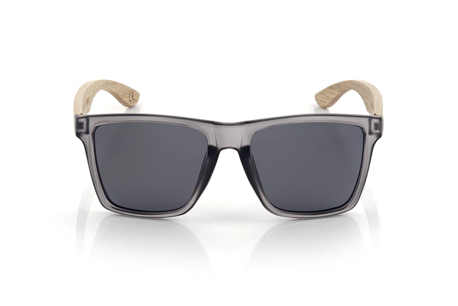 Wood eyewear of Zebrano RUN GREY DS. The RUN GREY DS sunglasses are made with the front of transparent grey matte synthetic material and the temples in zebrano wood, it is a very masculine angular square model with an air to the famous okley combined with four lens colors that are They will adapt perfectly to your taste and your modern style. Front Measurement: 144X51mm for Wholesale & Retail | Root Sunglasses® 