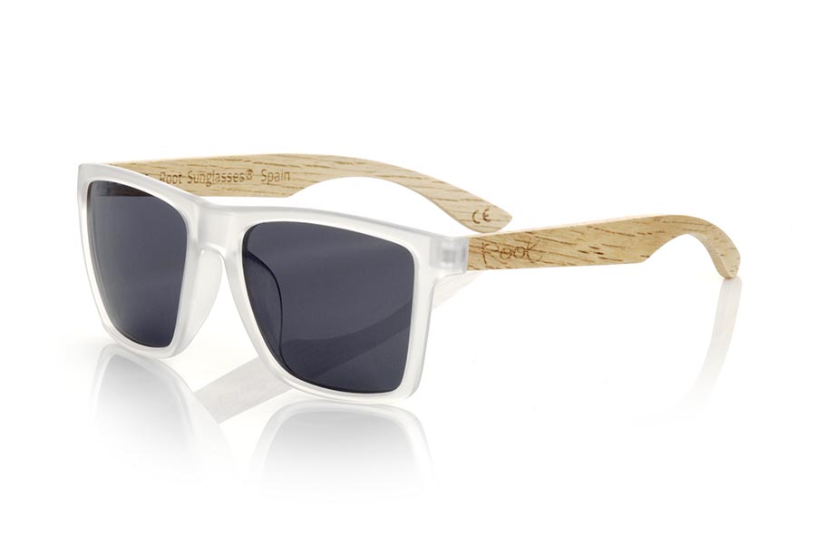 Wood eyewear of Zebrano RUN TR DS. The RUN TR DS sunglasses are made with the front of transparent matte synthetic material and the temples in zebrano, it is a very masculine angular square model with an air to the famous okley combined with four lens colors that are They will adapt perfectly to your taste and your modern style. Front Measurement: 144X51mm for Wholesale & Retail | Root Sunglasses® 