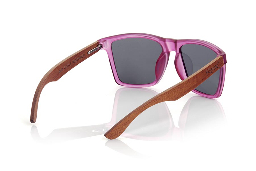 Wood eyewear of rosewood RUN PURPLE DS. The RUN PURPLE DS sunglasses are made with the front of transparent purple matte synthetic material and the temples in rosewood, it is a very masculine angular square model with an air to the famous okley combined with four lens colors that are They will adapt perfectly to your taste and your modern style. Front Measurement: 144X51mm for Wholesale & Retail | Root Sunglasses® 