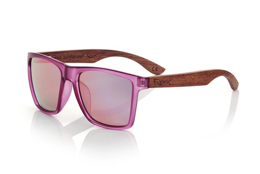 Wood eyewear of rosewood RUN PURPLE DS. The RUN PURPLE DS sunglasses are made with the front of transparent purple matte synthetic material and the temples in rosewood, it is a very masculine angular square model with an air to the famous okley combined with four lens colors that are They will adapt perfectly to your taste and your modern style. Front Measurement: 144X51mm for Wholesale & Retail | Root Sunglasses® 