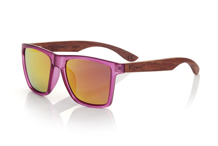 Wood eyewear of rosewood RUN PURPLE DS. The RUN PURPLE DS sunglasses are made with the front of transparent purple matte synthetic material and the temples in rosewood, it is a very masculine angular square model with an air to the famous okley combined with four lens colors that are They will adapt perfectly to your taste and your modern style. Front Measurement: 144X51mm for Wholesale & Retail | Root Sunglasses® 