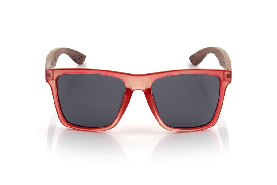 Wood eyewear of rosewood RUN RED DS. The RUN RED DS sunglasses are made with the front of transparent red matte synthetic material and the temples in rosewood, it is a very masculine angular square model with an air to the famous okley combined with four lens colors that are They will adapt perfectly to your taste and your modern style. Front Measurement: 144X51mm for Wholesale & Retail | Root Sunglasses® 