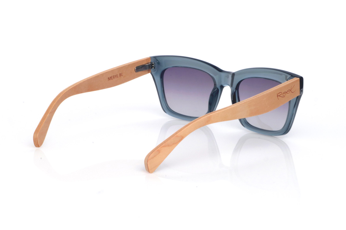 Wood eyewear of Maple MERYL DS. The MERYL wooden sunglasses stand out for their translucent blue-grey front, with an oversized square silhouette and a subtle cat-eye touch that feels flattering and full of presence. The shape is clean and modern, with a balanced thickness that frames the lenses nicely without looking heavy.

The soft gradient lenses complete the look, while the maple wood temples add a natural, light contrast and a comfortable feel for everyday wear.

Dimensions: 145x50 mm
Calibre: 51
 for Wholesale & Retail | Root Sunglasses® 