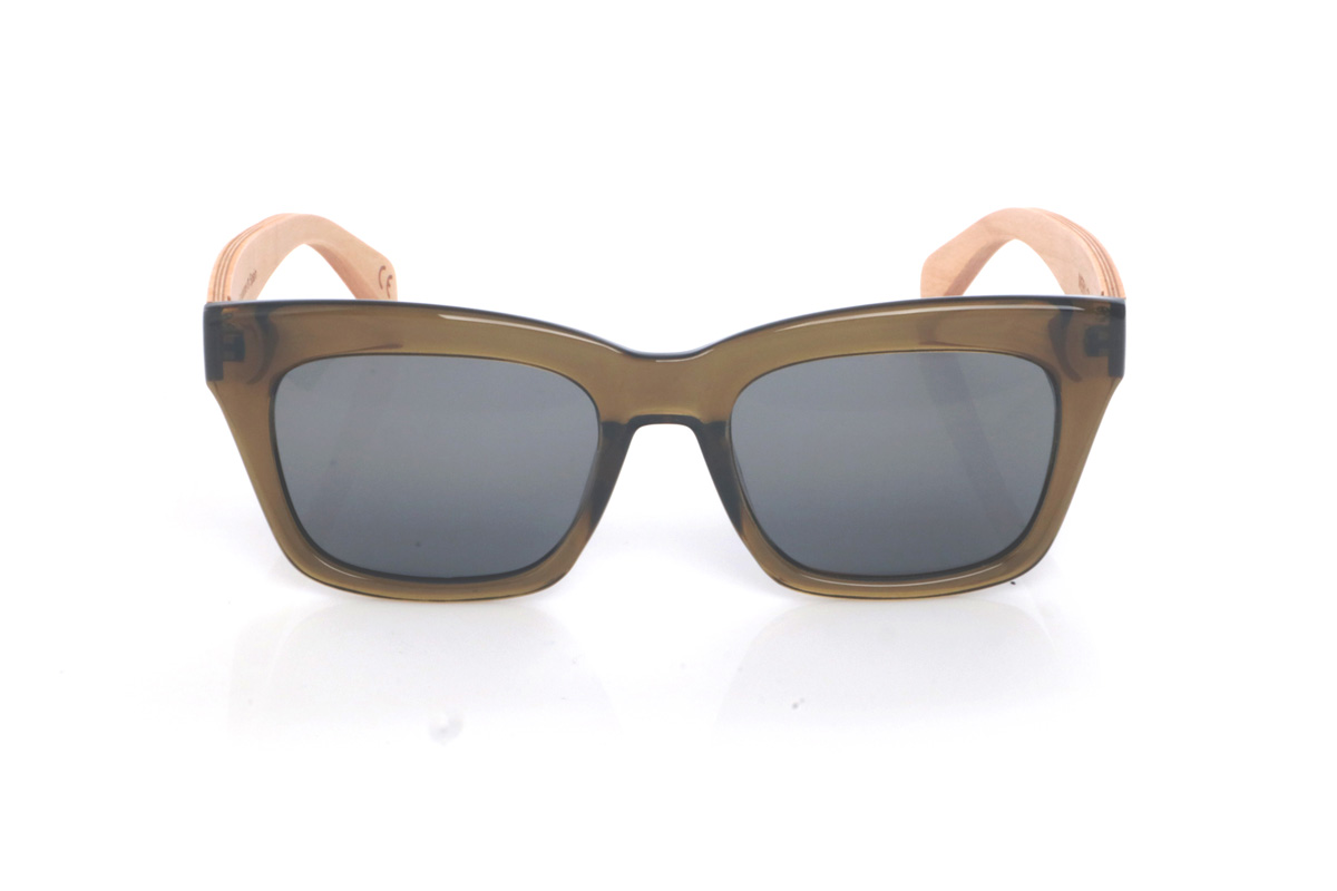Wood eyewear of Maple MERYL GR. The MERYL GR sunglasses stand out for their bold, slightly cat-eye square silhouette, with a translucent smoky green front that feels modern, elegant, and easy to wear. The clean, structured lines add presence without looking heavy, and the subtle transparency gives the frame depth and a refined finish.

Maple wood temples add a warm, natural contrast and keep the look balanced and lightweight, with a smooth profile designed for comfortable everyday wear.

Dimensions: 145x50 mm
Calibre: 51
 for Wholesale & Retail | Root Sunglasses® 