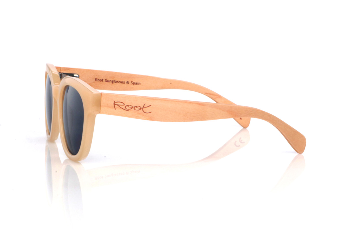 Wood eyewear of Maple SOELIA. SOELIA wooden sunglasses feature a translucent cream/sand acetate front with a rounded, slightly cat-eye shape that feels soft, flattering, and very easy to wear. The outline is clean and well-balanced, with gently wrapped lines that add presence without looking heavy.

Maple wood temples add a natural contrast and keep the overall feel lightweight and comfortable for everyday use. A bright, minimalist style that pairs perfectly with neutral and summer looks.

Dimensions: 144x50 mm
Calibre: 48
 for Wholesale & Retail | Root Sunglasses® 