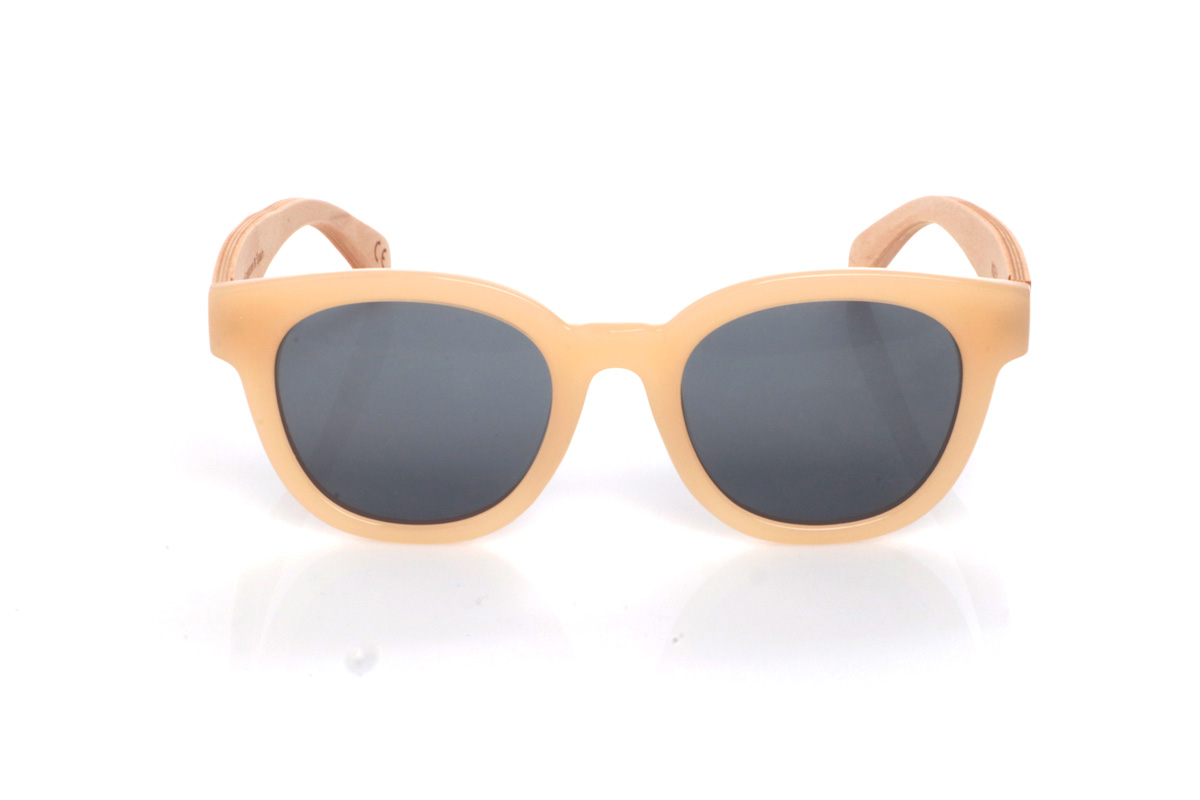 Wood eyewear of Maple SOELIA. SOELIA wooden sunglasses feature a translucent cream/sand acetate front with a rounded, slightly cat-eye shape that feels soft, flattering, and very easy to wear. The outline is clean and well-balanced, with gently wrapped lines that add presence without looking heavy.

Maple wood temples add a natural contrast and keep the overall feel lightweight and comfortable for everyday use. A bright, minimalist style that pairs perfectly with neutral and summer looks.

Dimensions: 144x50 mm
Calibre: 48
 for Wholesale & Retail | Root Sunglasses® 