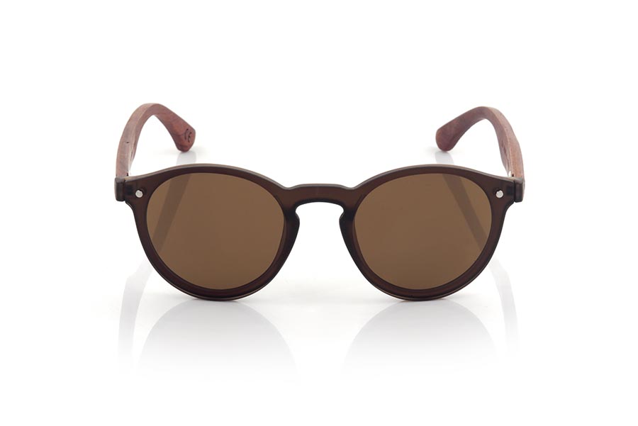 Wood eyewear of Rosewood SUN BROWN. SUN BROWN sunglasses are made with Brown synthetic material front and sideburns in rosewood engraved with an ethnic pattern, it's a female model rounded very current trend lenses cover around the front... Front size: 136X49mm for Wholesale & Retail | Root Sunglasses® 