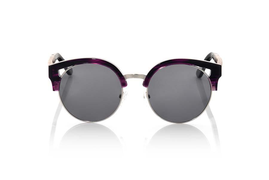 Wood eyewear of Rosewood ARYA. ARYA sunglasses of the MIXED PREMIUM series are manufactured with the front in acetate high-quality color purple and sideburns in natural ROSEWOOD finished in Rod covered in black acetate that can be adjusted if necessary. It's a model with eyebrow stylish acetate which sit perfectly to them. The quality of the materials and their perfect completion will surprise you. Front size: 140x54mm for Wholesale & Retail | Root Sunglasses® 