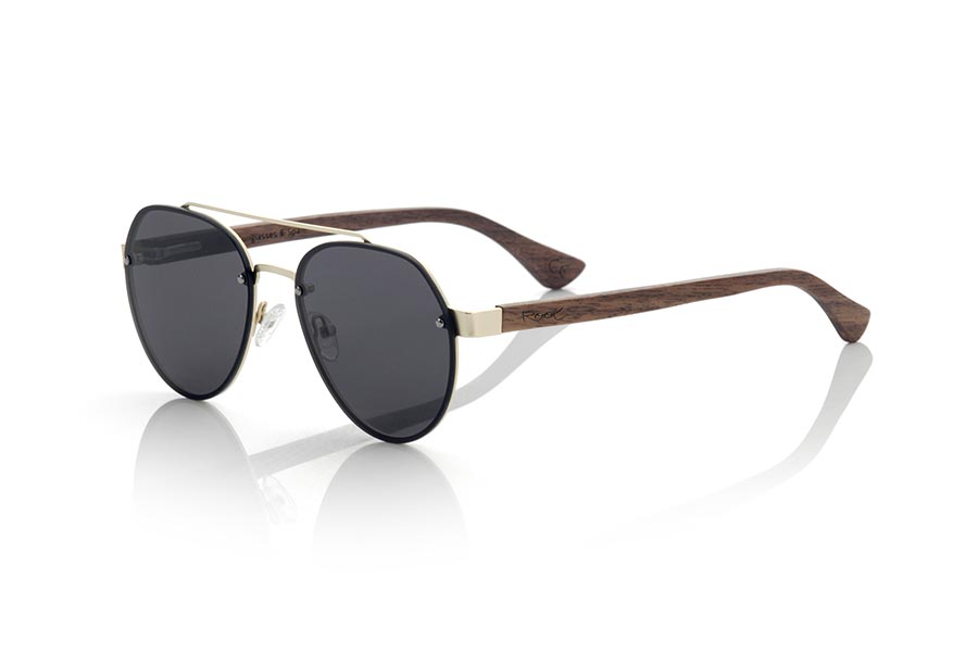 Wood eyewear of Walnut modelo MISURI. The Missouri MIXED PREMIUM series sunglasses are made with the front frame in gilded inxodable steel and the sideburns in natural walnut the flat lenses occupy the whole frame in both eyes will surprise you the quality of the materials and their termination Perfect. Frontal measurement: 137x50mm | Root Sunglasses® 