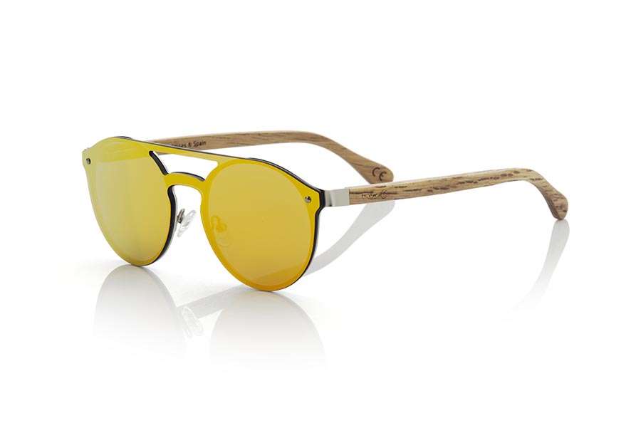 Wood eyewear of Duwood modelo DARLING. The DARLING MIXED PREMIUM series sunglasses are made of matte plated stainless steel front frame and natural Duwood wood sideburns flat lenses occupy the whole frame in both eyes you will be surprised by the quality of the materials and their Perfect termination. Frontal measurement: 142x51mm | Root Sunglasses®