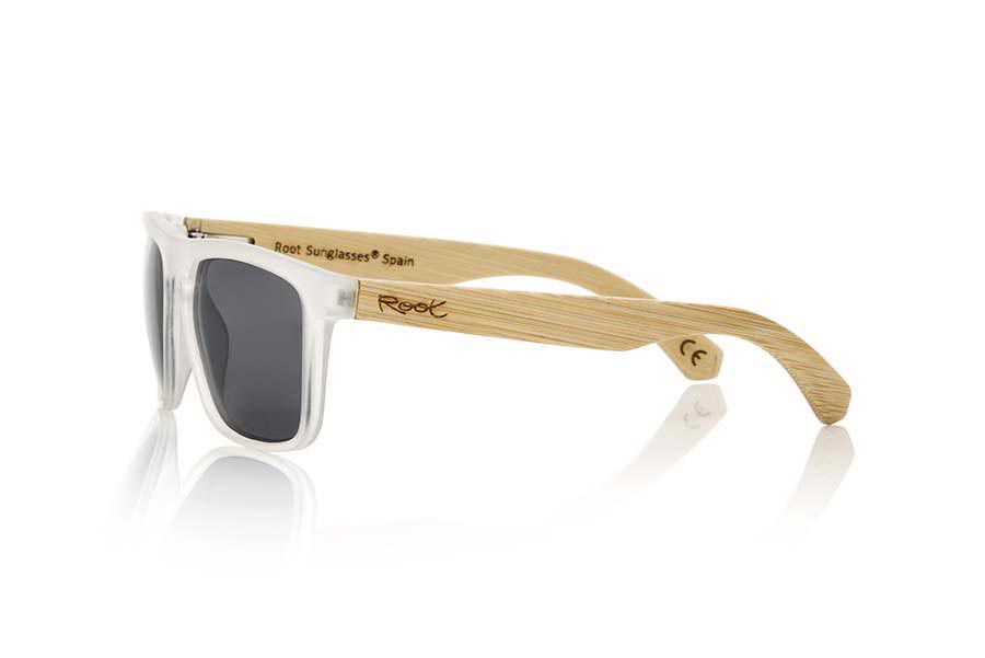 Wood eyewear of Bamboo WAVE TR. WAVE TR sunglasses are made of transparent white plastic front and sideburns in bamboo, it's a very masculine agunloso square model with a look at the famous okley combined with four colors of lenses that will adapt perfectly to your taste and to your modern style. Front size: 145X50mm for Wholesale & Retail | Root Sunglasses® 