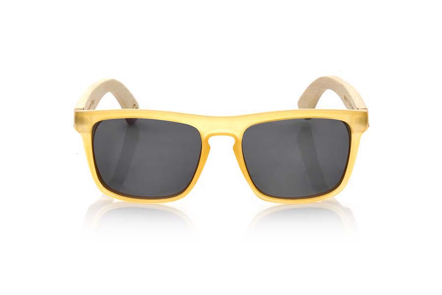 Wood eyewear of Bamboo WAVE YELLOW. WAVE YELLOW sunglasses are made of transparent matte yellow plastic front and sideburns in bamboo, it's a very male angled square model with a look at the famous okley combined with four colors of lenses that will adapt perfectly to your taste and to your modern style. Front size: 145X50mm for Wholesale & Retail | Root Sunglasses® 