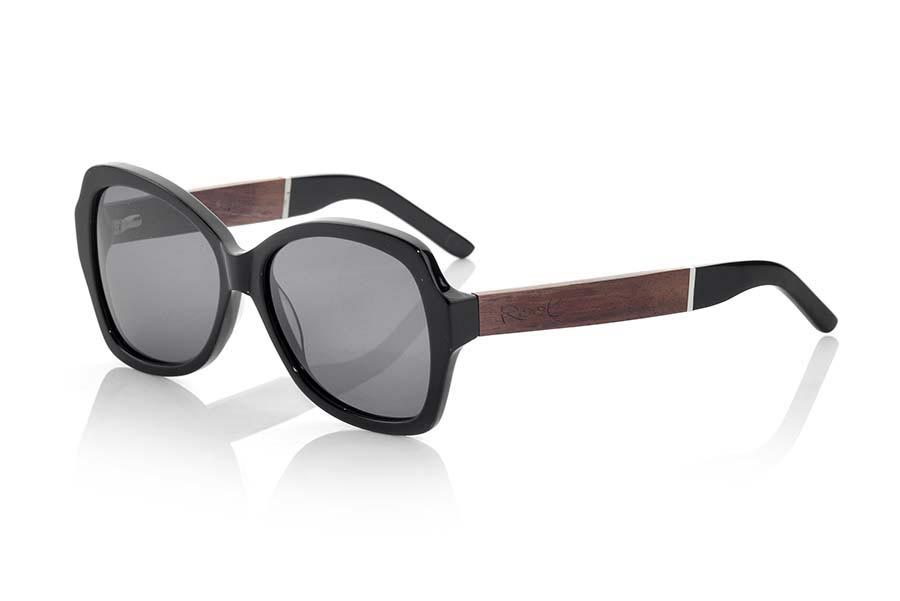 Wood eyewear of  KENYA BLACK. KENYA series MIXED PREMIUM BLACK sunglasses are manufactured with the front in acetate quality black and sideburns in natural ROSEWOOD finished in Rod covered in black acetate that can be adjusted if necessary. It's a very elegant model that sit perfectly to them. The quality of the materials and their perfect completion will surprise you. Front size: 146x56mm for Wholesale & Retail | Root Sunglasses® 