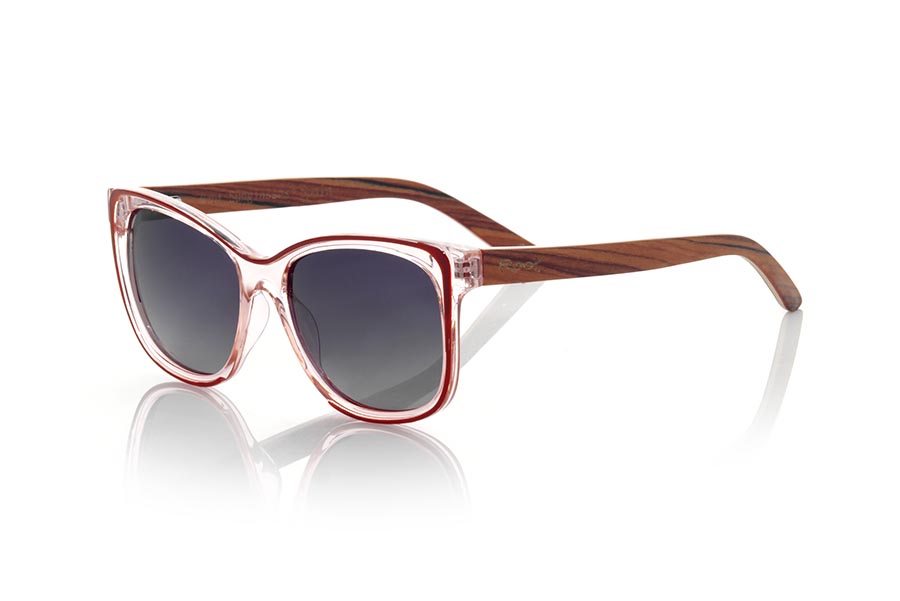 Gafas de Madera Natural de Mahogany modelo ZAHARA. Las gafas de sol ZAHARA están fabricadas con el frontal en material PC de color transparente brillo y marrón y las varillas de madera de MAHOGANY Natural. Modelo muy femenino de formas sugerentes inspiradas en las playas de ZAHARA DE LOS ATUNES , las gafas ZAHARA han sido combinadas de serie con varias lentes. Medida frontal: 143x53mm | Root Sunglasses® 