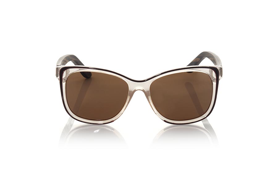 Wood eyewear of Rosewood PALOMA. The PALOMA sunglasses are made with the front in PC material transparent pink and black and the legs in natural rosewood. Very feminine model of suggestive shapes inspired by the beaches of CAPE DE PUNTA PALOMA, the PALOMA sunglasses have been combined as standard with several lenses. Front measurement: 143x53mm for Wholesale & Retail | Root Sunglasses® 