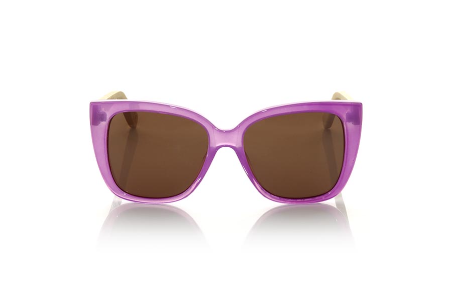Wood eyewear of Bambú LANCES. The lances sunglasses are made with the front in fuchsia PC material and the Natural bamboo wood sideburns. Very feminine model of suggestive shapes inspired by the beaches of the lances in TARIFA, the lances sunglasses have been combined with several lenses. Frontal measurement: 145x56mm for Wholesale & Retail | Root Sunglasses® 